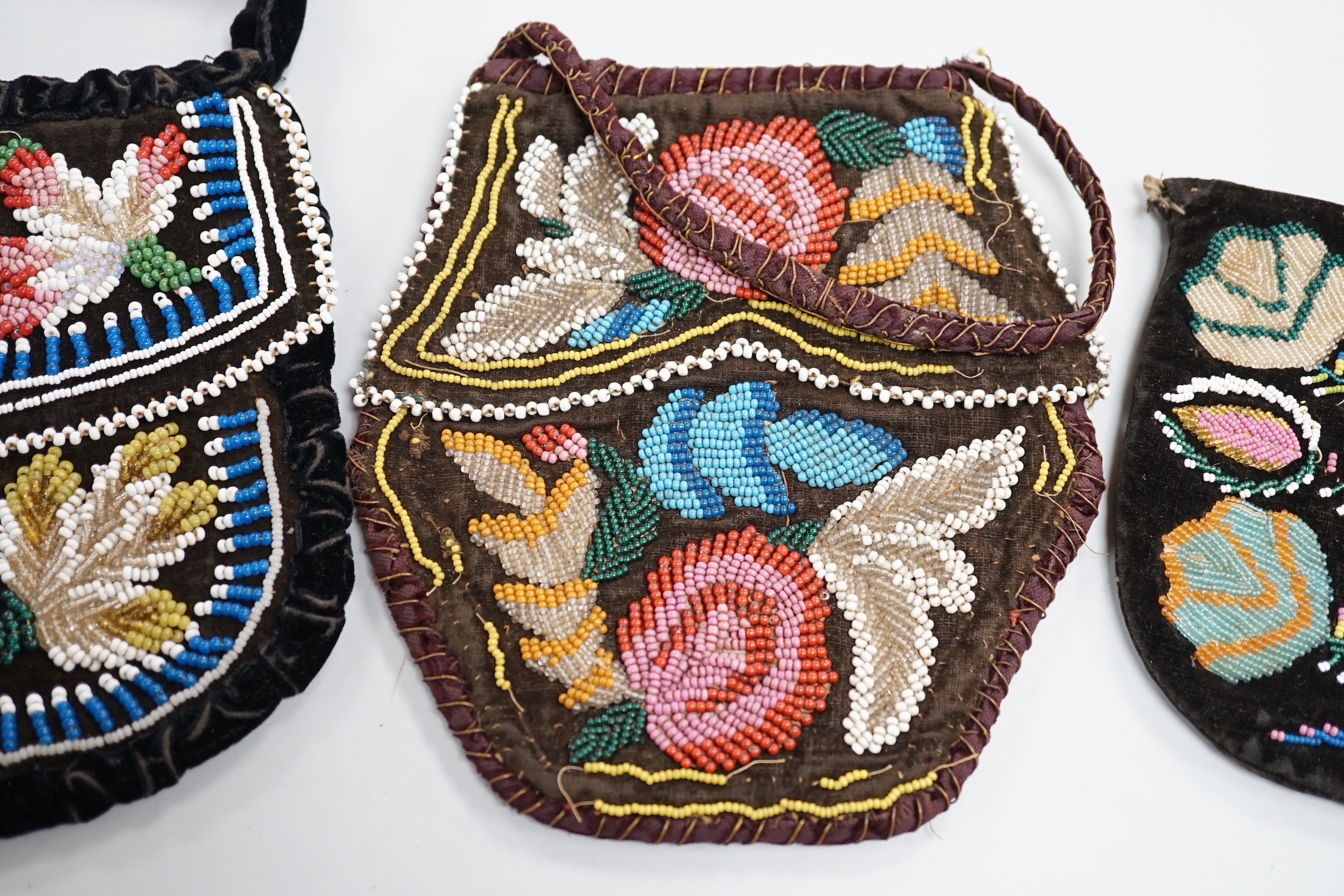 Three mid to late 19th century Haudenosaunee (Iroquois) North American Indian glass beaded velvet bags
